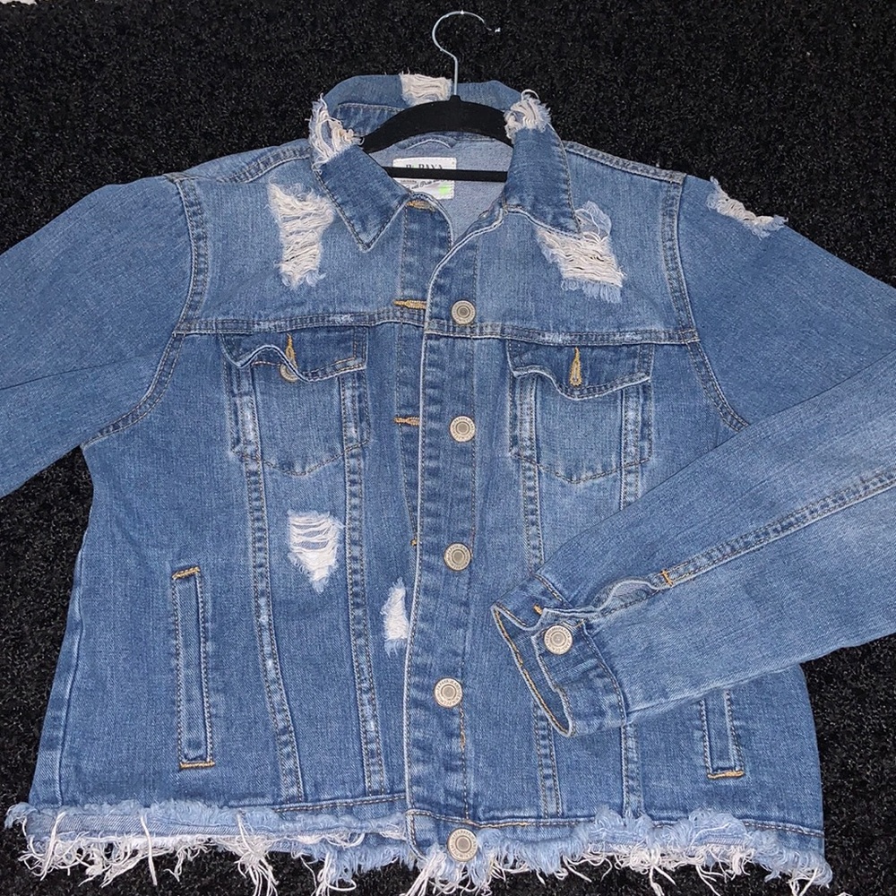 Distressed denim jacket